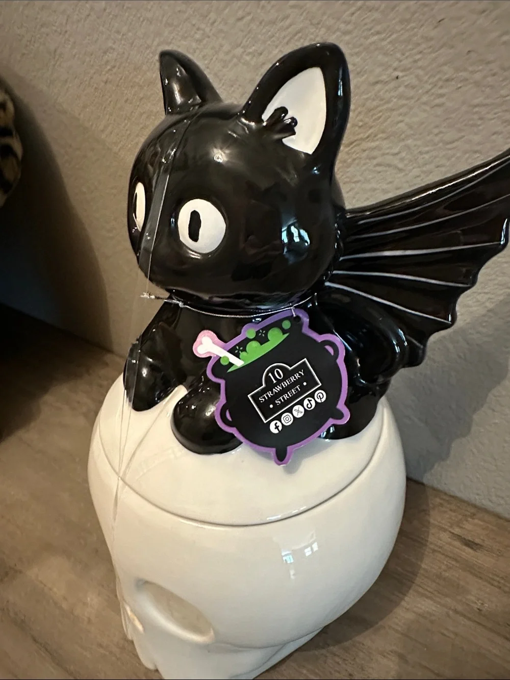 10 Strawberry Street Cat Bat Sitting On A Skull Cookie Jar/Canister